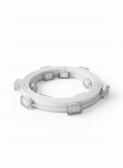 Roll of LED strip lights on a white background