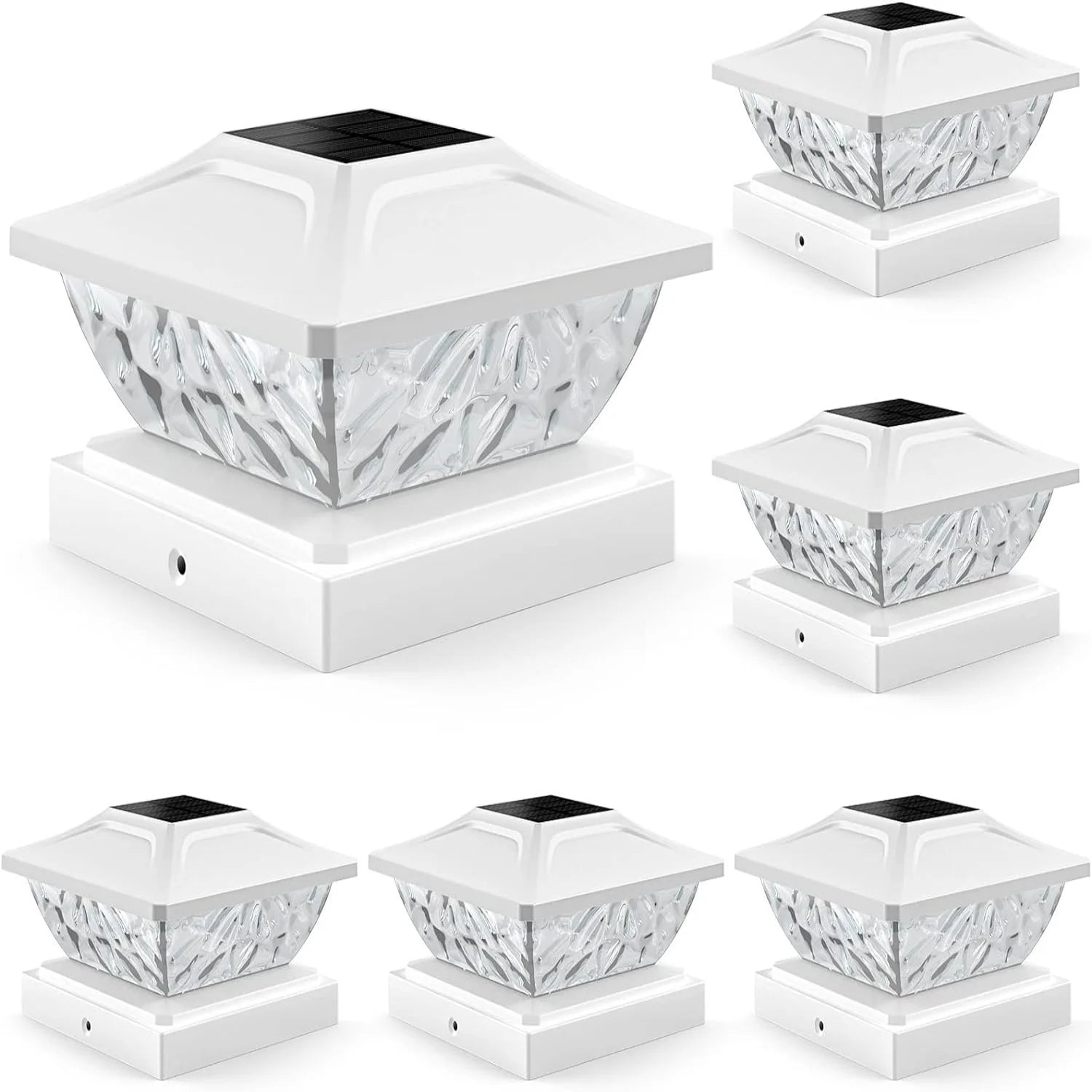 Set of six white solar post cap lights on a white background